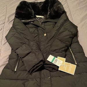 Black Large Down Fill
Very Warm for Winter
Faux Fur trim on Hood
Gold Hardware